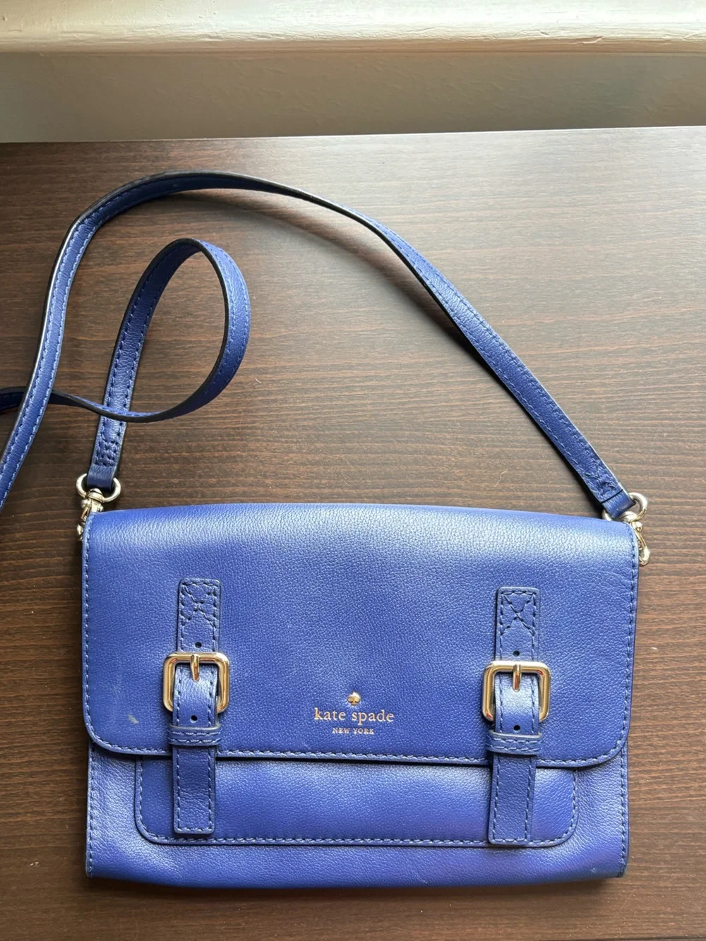 kate spade cobalt blue leather crossbody with buckle accents